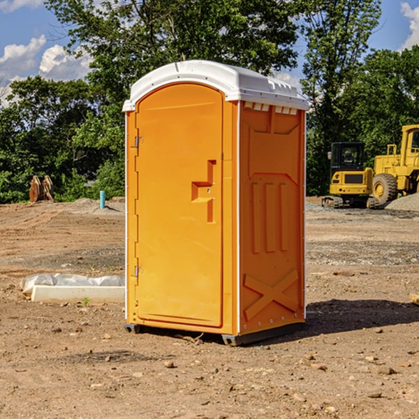 how often are the porta potties cleaned and serviced during a rental period in Kinsley